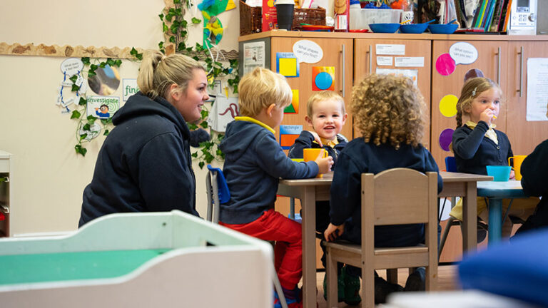 Sunrise Day Nursery - Harrietsham staff teacher interacting with the children